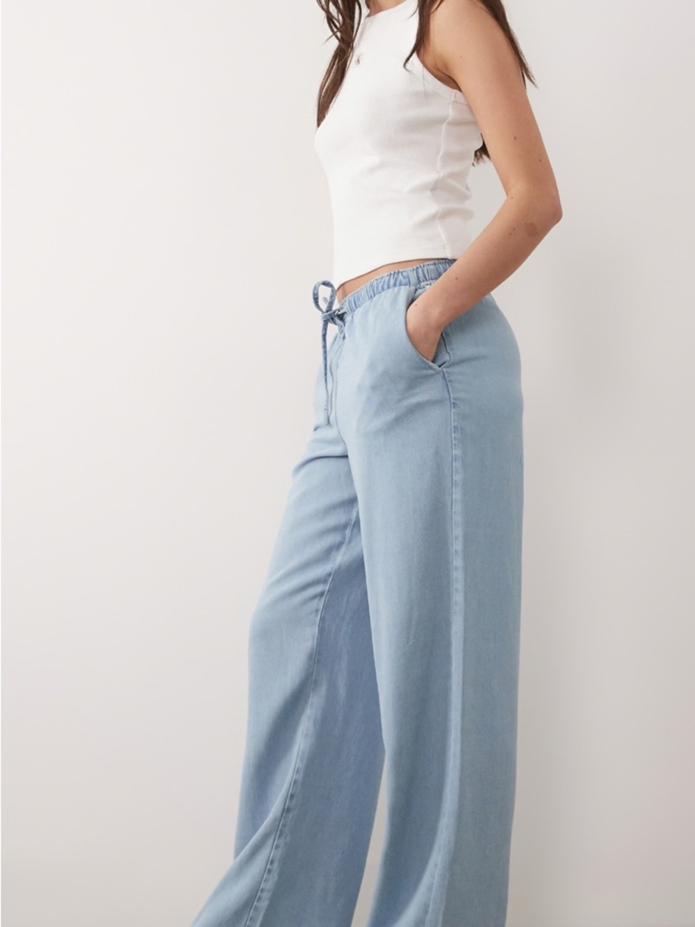 BEBE Light Wash Wide Leg Drawstring Pants size L